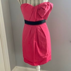 Perfect pink part dress with bow detail.